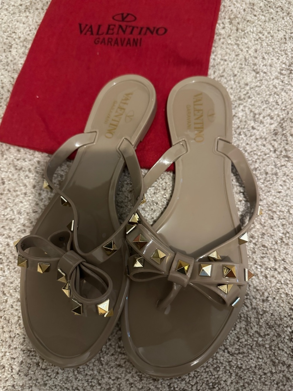 Valentino Garavani Taupe Jelly Bow Sandals with Gold Rockstuds